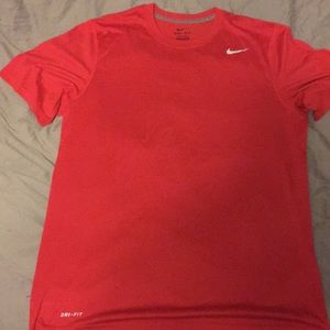 Red Nike athletic shirt